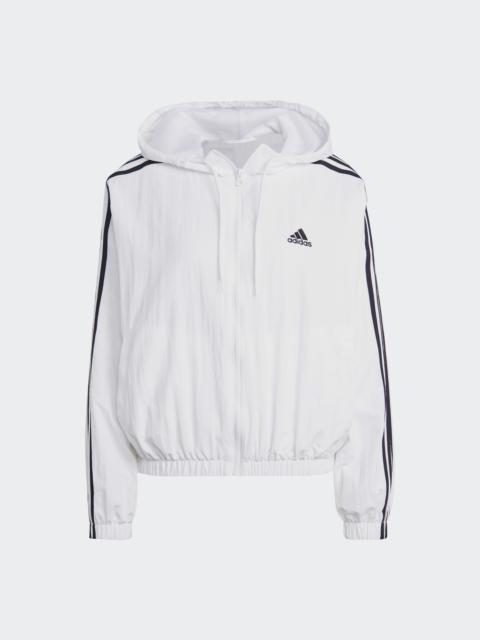 adidas Essentials 3-Stripes에 의하여 길쌈되는 Windbreaker