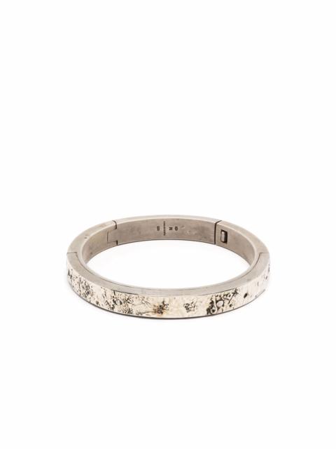 Parts of Four Sistema acid-treated bracelet