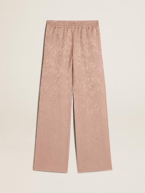 Women's pink viscose pants with floral pattern