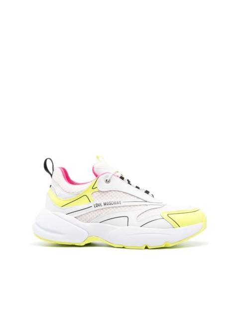 Moschino logo-print panelled mesh sneakers