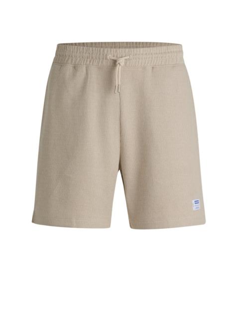 HUGO LOOSE-FIT SHORTS IN WAFFLE-STRUCTURED COTTON
