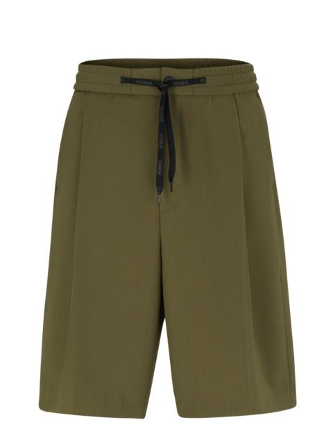 HUGO RELAXED-FIT SHORTS IN STRUCTURED PERFORMANCE-STRETCH FABRIC