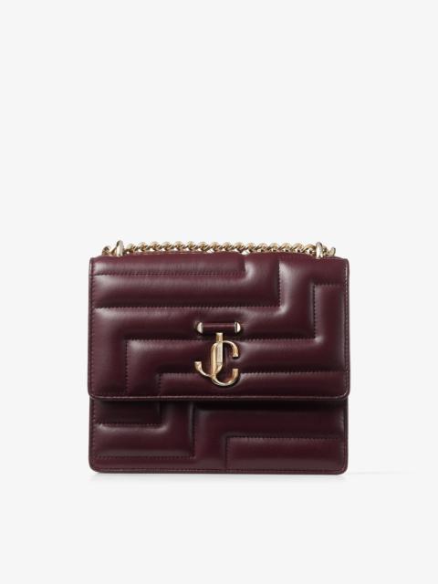 JIMMY CHOO Varenne Avenue Quad
Burgundy Avenue Nappa Leather Bag with Light Gold JC Emblem