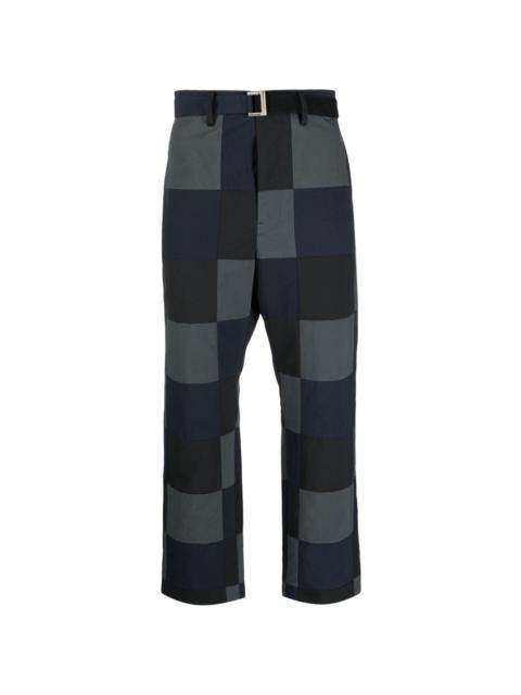 sacai checkerboard-print cotton chino trousers
