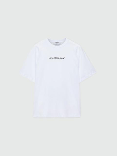 MSGM White short-sleeve cotton jersey T-shirt with "Late Bloomer" quote print on the front