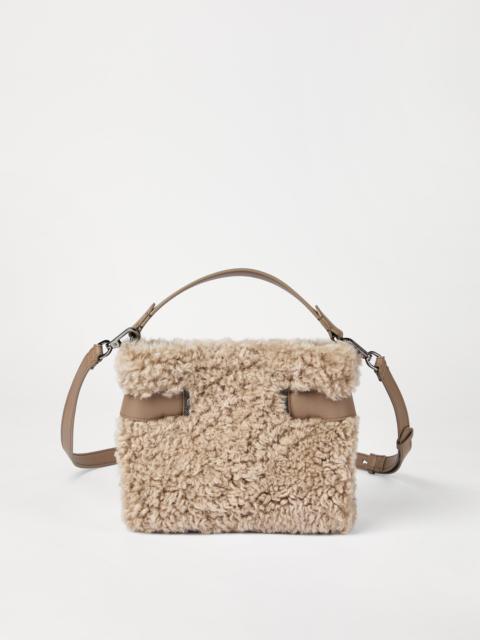 Brunello Cucinelli Essence small top-handle bag in merino shearling with shiny bands