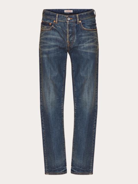 DENIM PANTS WITH METALLIC V DETAIL