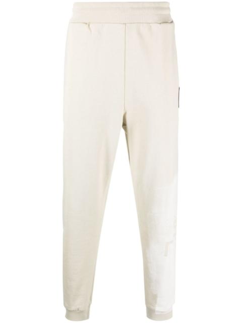 Brushstroke tapered track pants