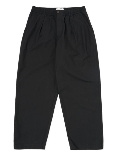 Universal Works button-fastening trousers