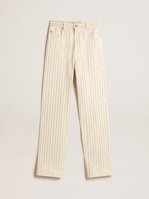 White pants with baguette-shaped studs