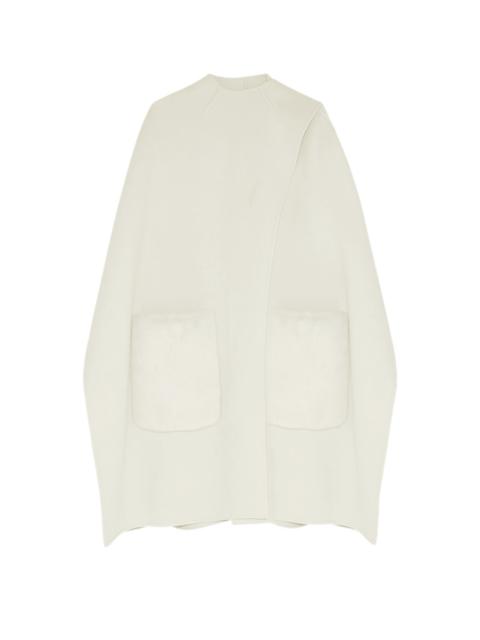 Cashmere cape with mink over-pockets