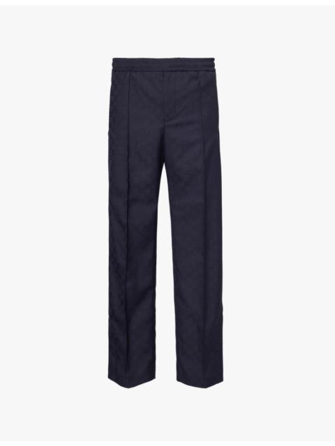 Monogram-pattern straight-leg mid-rise woven trousers
