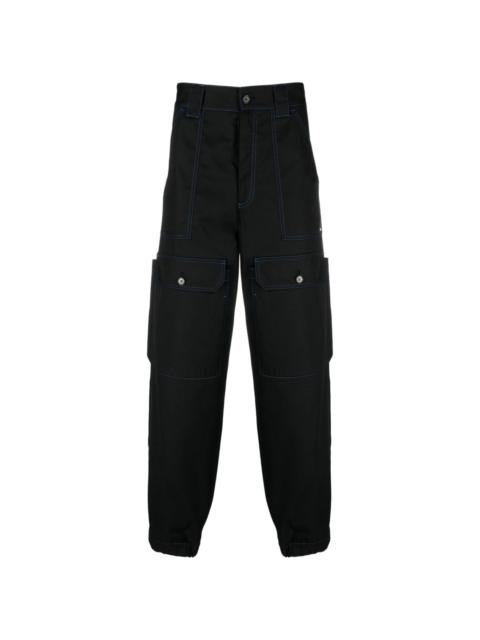 MSGM contrasting-stitch logo-patch trousers