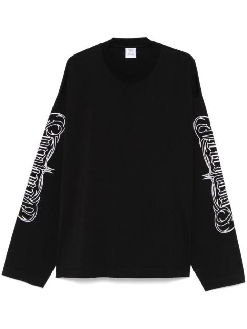 VETEMENTS♡ OVAL LOGO CUT-UP LONGSLEEVE VETEMENTS: Black Oval Logo Cut-Out T-shirt | SSENSE