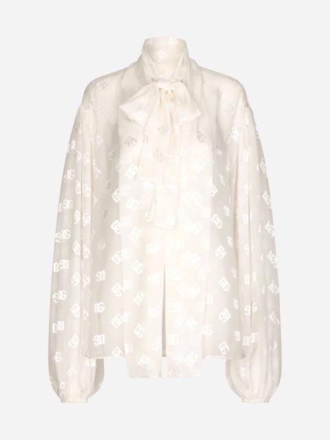 Dolce & Gabbana Devoré satin pussy-bow shirt with all-over DG logo