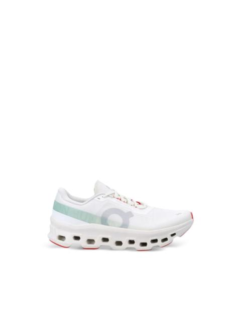 On Cloudmonster logo sneakers
