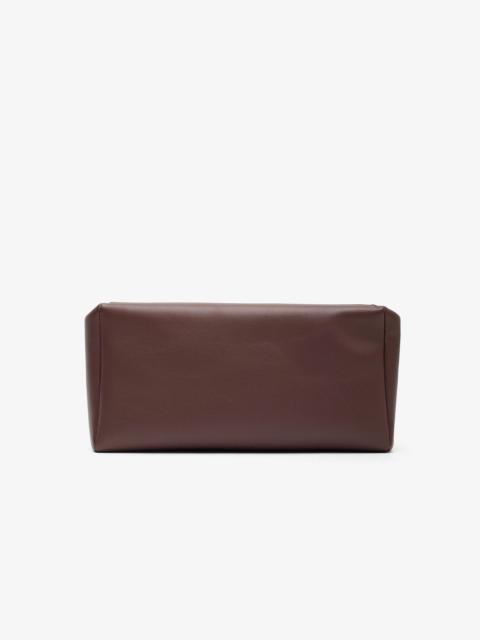 The Row Squared compact brown leather clutch