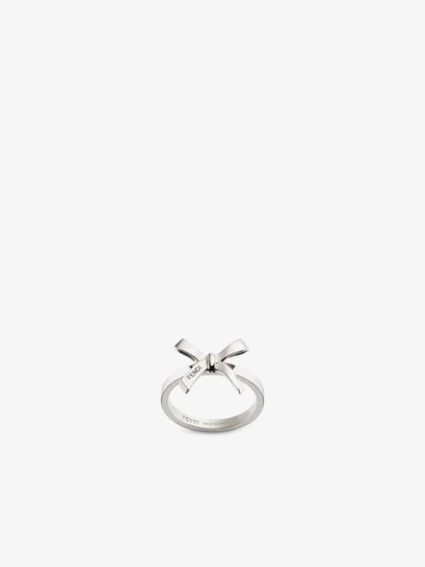 FENDI Ring with small bow. Made of palladium-finish metal. Decorated with Fendi lettering enameled in blac