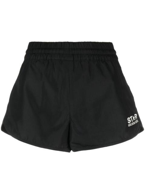 Black leather Bermuda shorts with lived-in effect