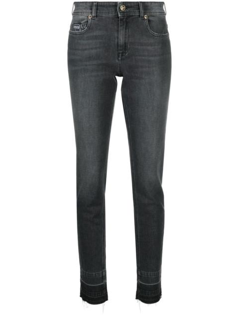 VERSACE JEANS COUTURE logo-patch skinny jeans