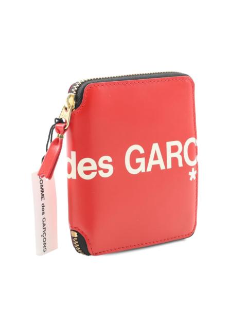 Comme Des Garçons logo-print round zipper wallet