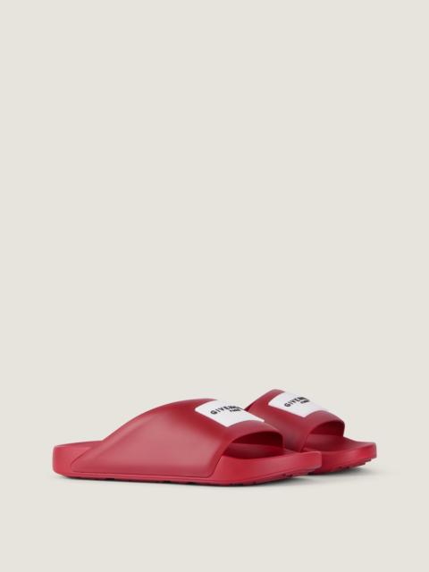 Givenchy LABEL SLIDE FLAT MULES IN RUBBER