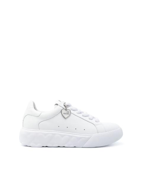 Moschino logo-patch leather sneakers