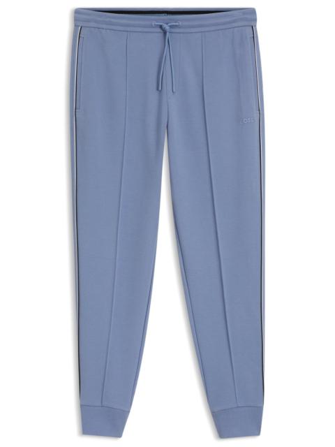 BOSS PIPING-DETAIL TRACKSUIT BOTTOMS IN A COTTON BLEND