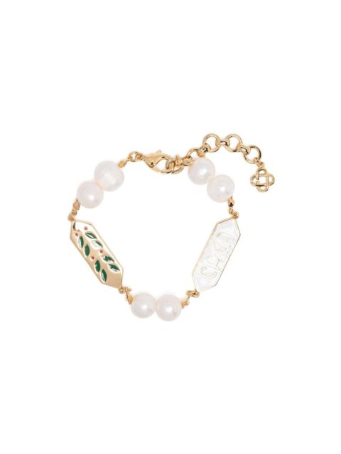 logo-plaque pearl-embellished bracelet