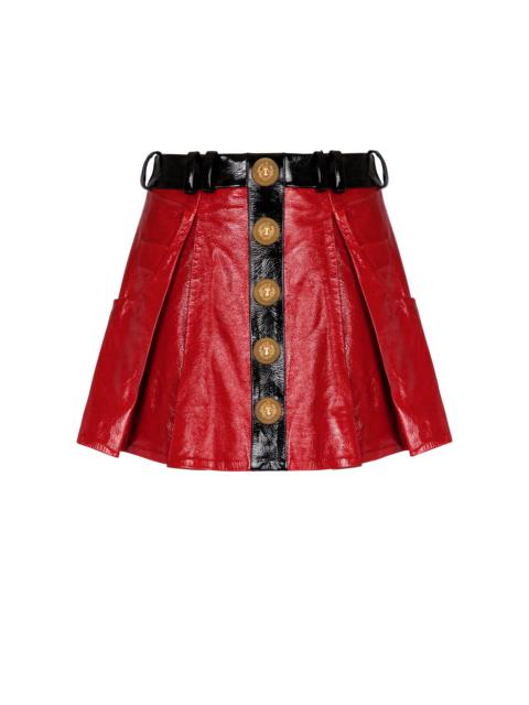 Pleated patent leather skirt