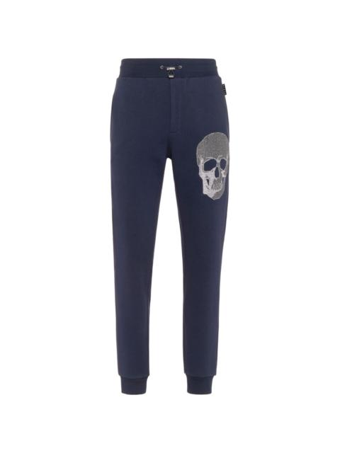 skull-embellished track pants