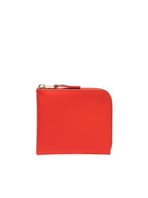 Comme Des Garçons small zip-around wallet | REVERSIBLE