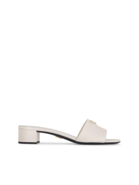 Prada 35mm triangle-logo mules