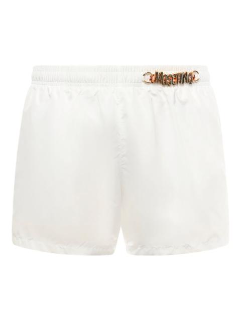 Moschino logo-plaque swim shorts