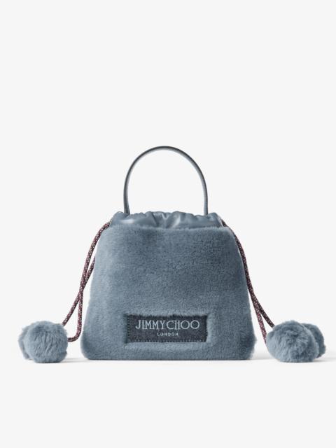 JIMMY CHOO Drawstring Pouch Top Handle Arctic Blue Shearling and Nappa Leather Drawstring Pouch with Pom-Poms
