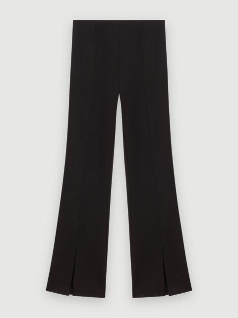 maje Black slim-fit trousers with slits