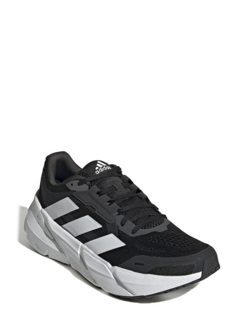 Adilette Tonys Chocolonely Running Shoe in Core Black/Ftwr White/Grey