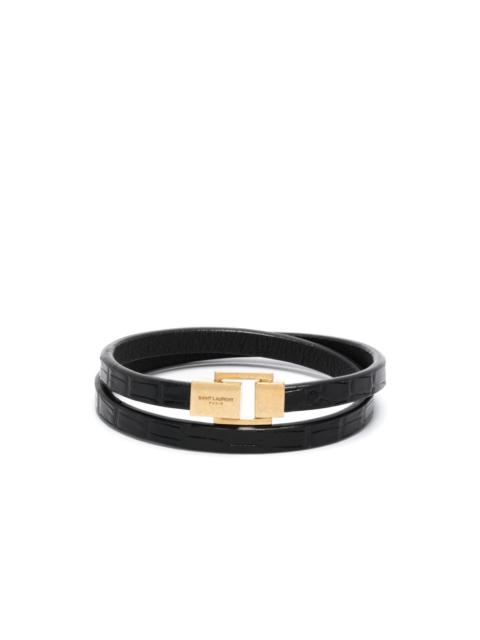 SAINT LAURENT logo-engraved leather bracelet