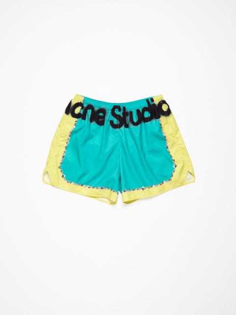 Acne Studios Printed swim shorts - Emerald green