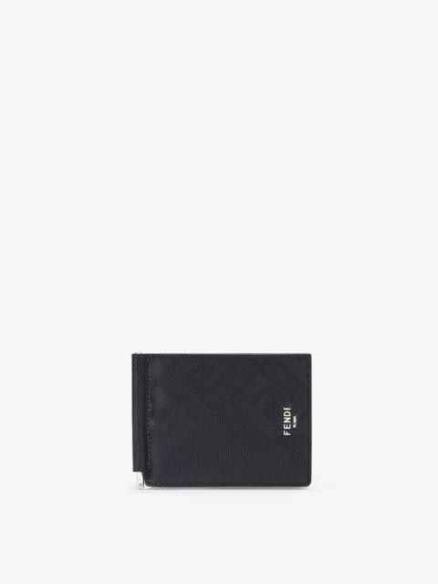 Flip-cover money clip with interior organized into six card slots. Made of black leather with emboss