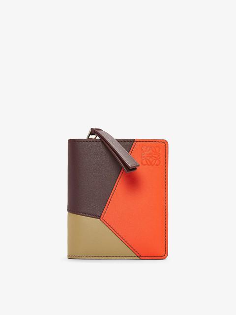 Puzzle compact leather zip wallet