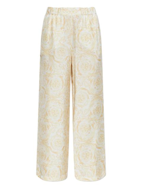 VERSACE floral-patterned trousers