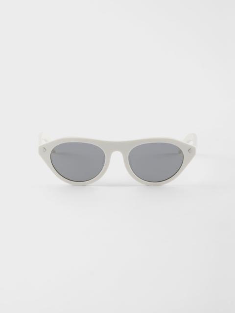 Prada Prada sunglasses with the iconic metal plaque