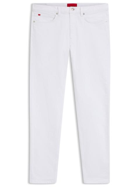 HUGO EXTRA-SLIM-FIT JEANS IN WHITE COMFORT-STRETCH DENIM
