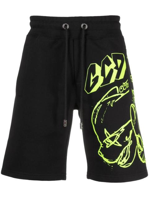 GCDS graffiti print track shorts