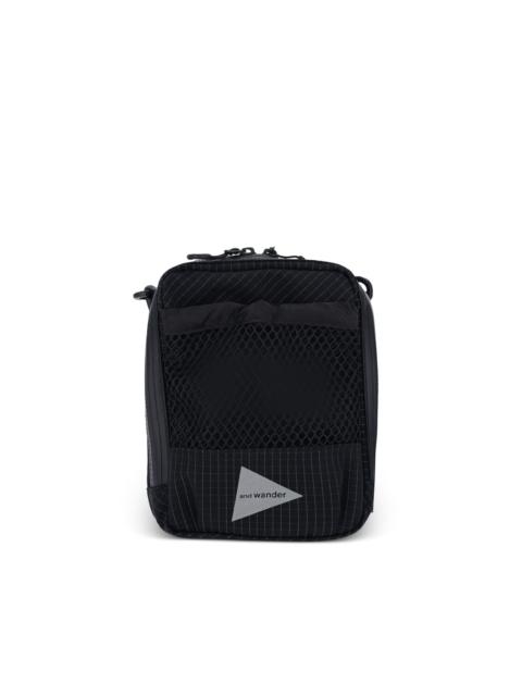and Wander Reflective messenger bag