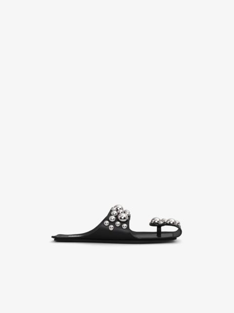 Alaïa FOLDED FLAT MULES WITH SPHERES ON CALFSKIN