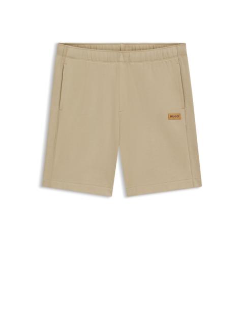 HUGO REGULAR-FIT SHORTS IN COTTON WITH SUEDE LOGO BADGE