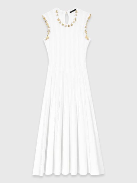 maje Knit dress with gold jewellery