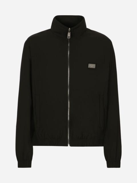 Light nylon jacket with branded tag